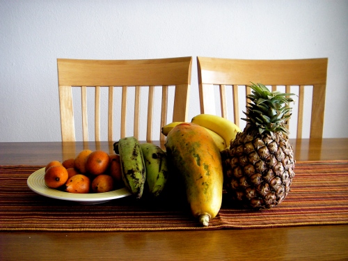 A selection of fruits fresh from the market: guamas de la india, platanos, papaya, bananas and pinapple